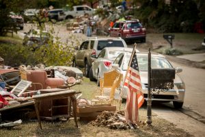 Residents pile flood-damaged debris in front of their homes in a neighborhood on Thursday, Oct. 8, 2015, in Columbia, S.C. LCMS Communications/Erik M. Lunsford