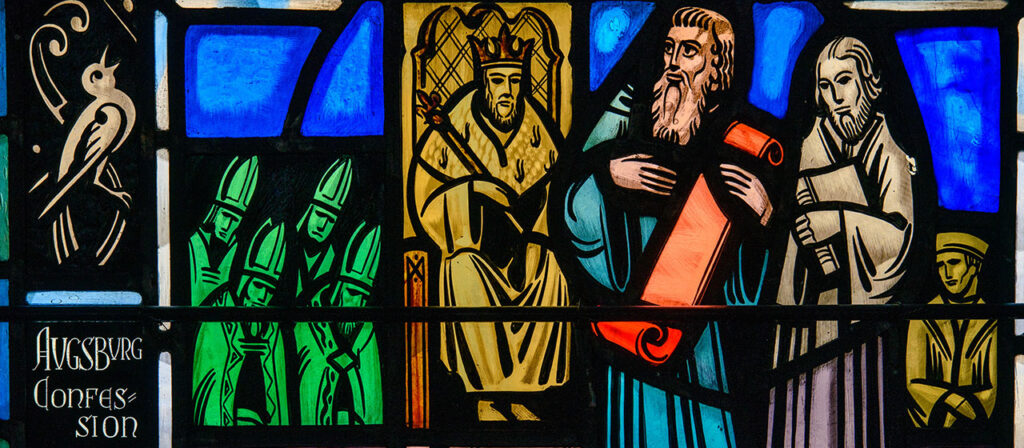 A stained glass window at Luther Memorial Chapel in Shorewood, Wis., depicts the presentation of the Augsburg Confession on June 25, 1530. (LCMS Communications/Erik M. Lunsford)