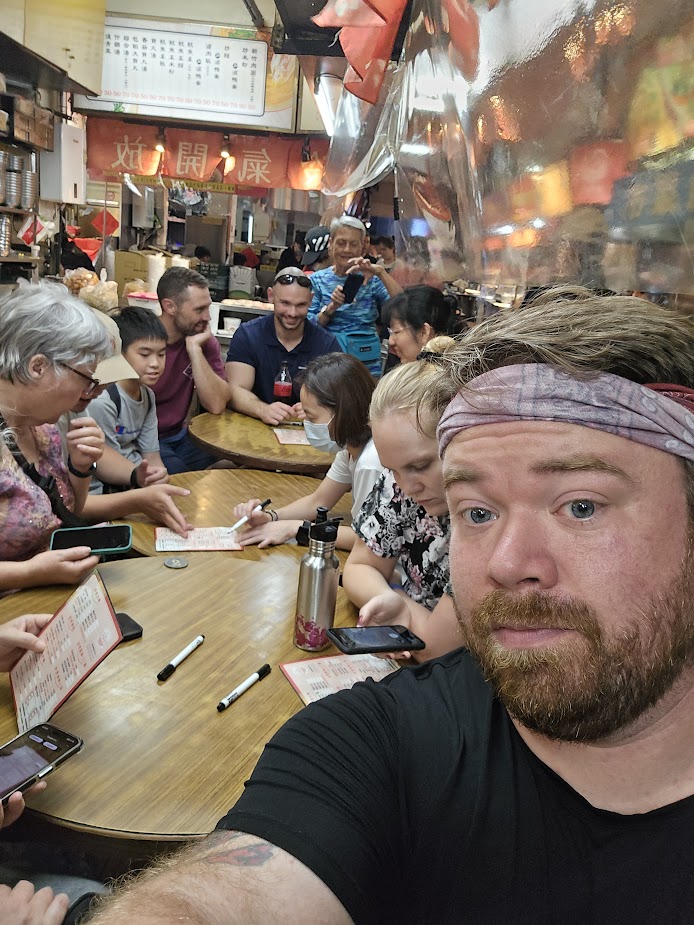 LCMS Short-Term Mission team member Myles Williams takes a selfie with English Bible Camp volunteers and participants at Holy Word Church in Hsinchu City, Taiwan, in July 2024. (Myles Williams)