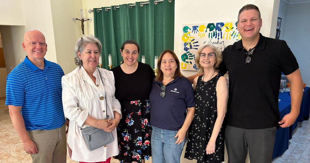 The Rev. Ross Davis, Lourdes Quesada, Deaconess Sarah Longmire, Ilse Arias, Jacqueline Llenas and the Rev. Adam Gless are pictured in the LCMS International Mission office in Santiago, Dominican Republic, on Aug. 29, 2025.