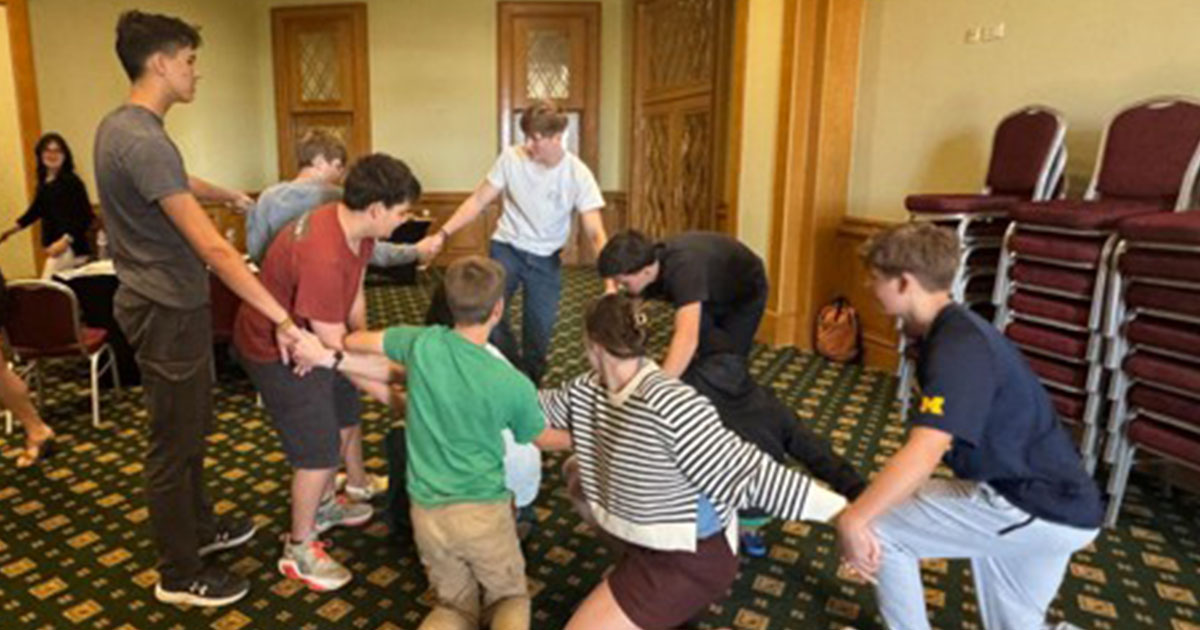 Have you ever played the human knot? It takes teamwork and communication to untangle without letting go of each other’s hands. (Trisha Festerling)